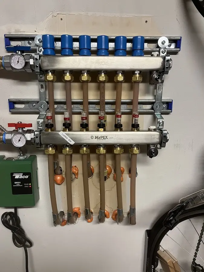 Plumber performing Gas Line Installation at a residential property in Blendon